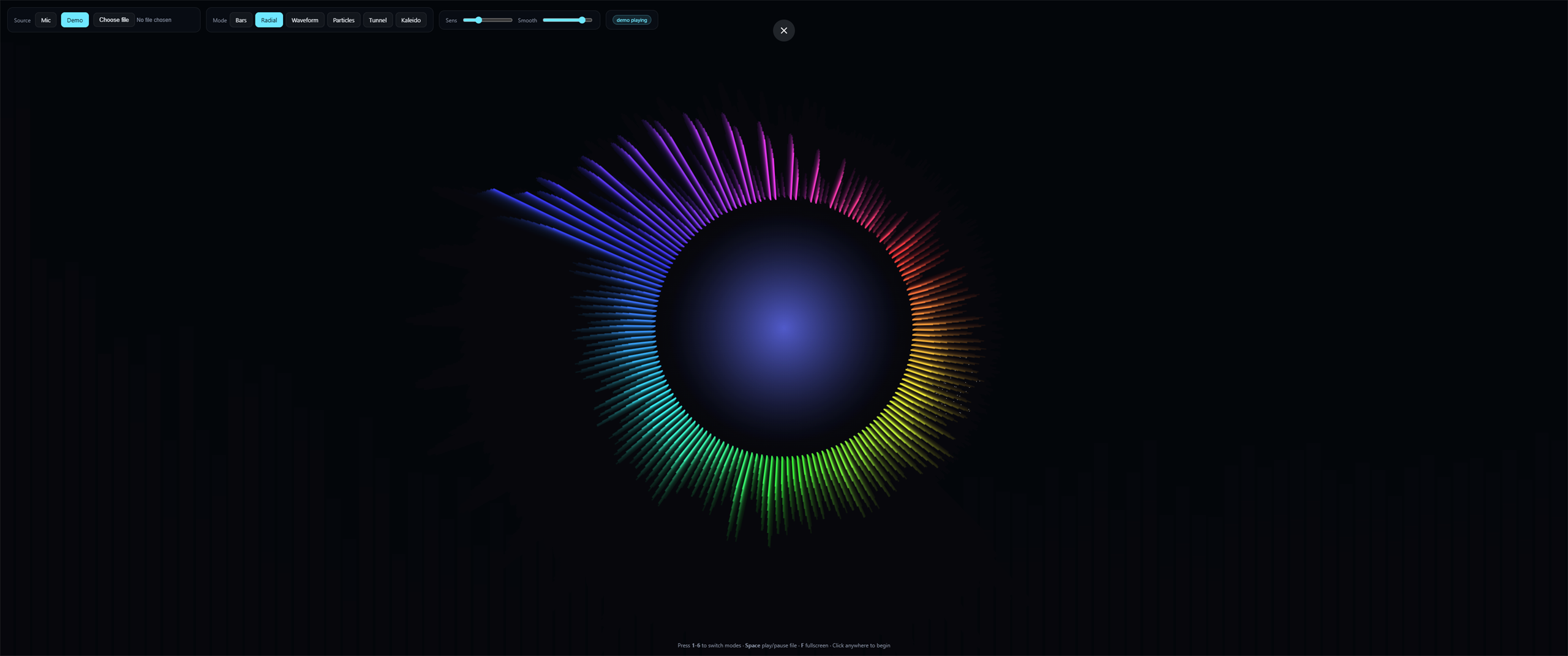 Build a music visualizer that takes audio input and renders real-time frequency-reactive animations with multiple visual modes.
